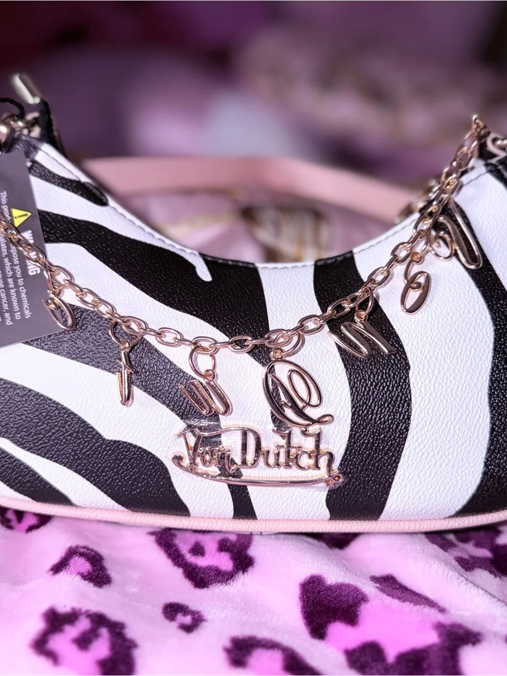 Von Dutch Rose Gold Charm Zebra Shoulder Bag in Black and White